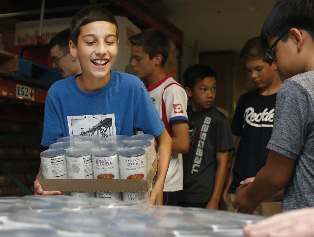 July 1993 - Des Moines is hit with record flooding, leaving the entire city without power and clean water. Donations come pouring in from across the country, and DMARC staff and volunteers work tirelessly for three weeks to provide assistance to residents through the Emergency Food Pantry.